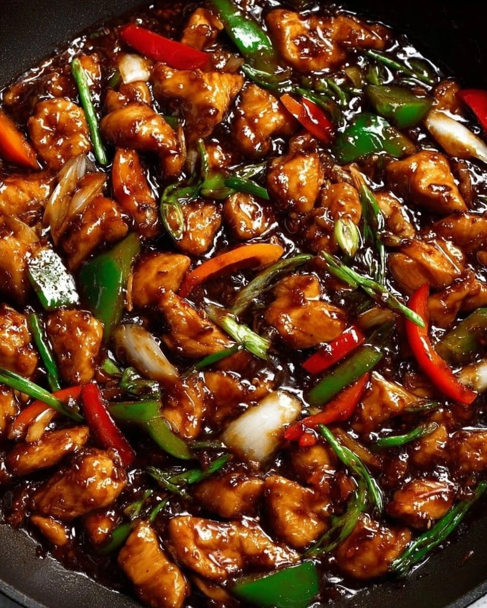 Delicious chicken in garlic sauce served on a plate.