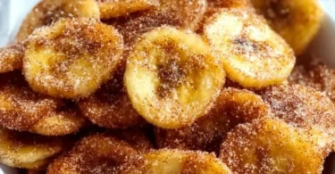 Crispy cinnamon-sugar banana chips made in an air fryer for a sweet snack