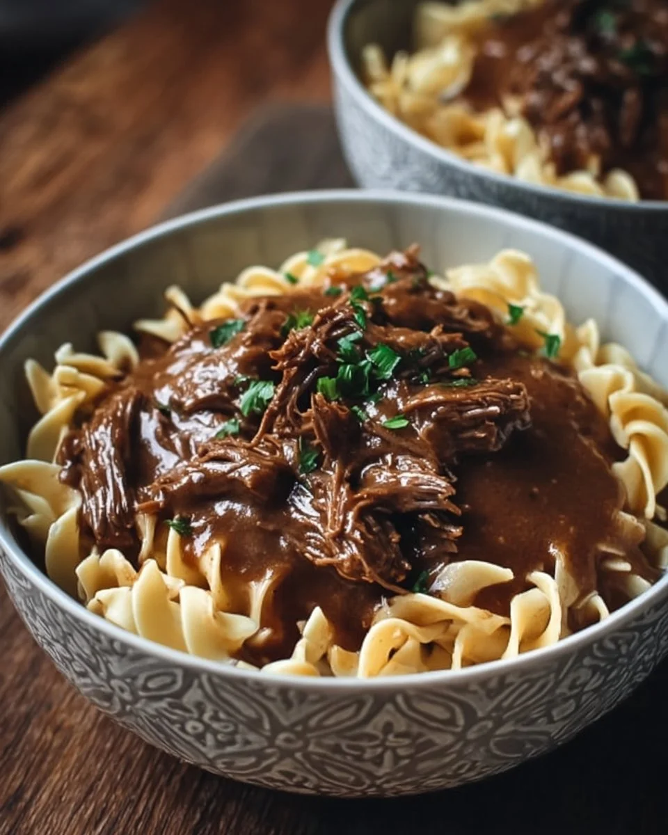 A delicious slow cooker beef and noodles dish served in a bowl